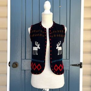 Navy Knit Vest with Reindeer Design
women’s size medium